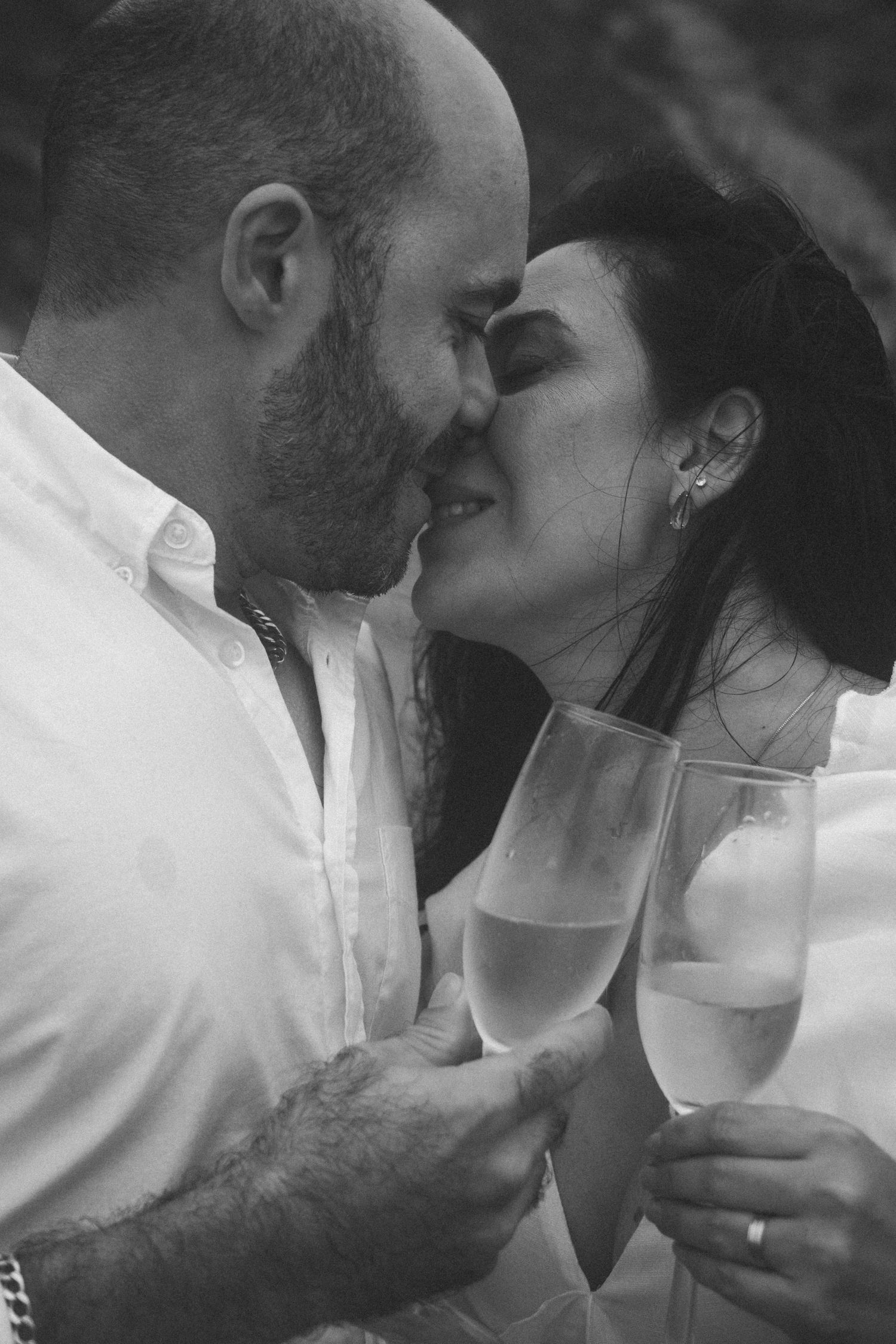 Black and white photo series showing tender moments between a couple.