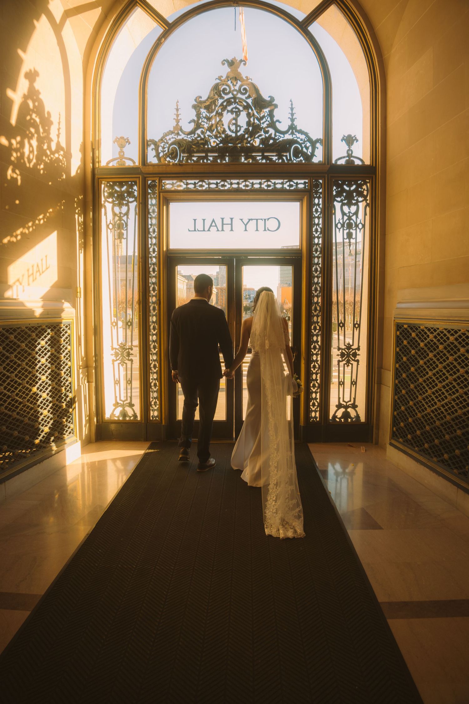 Silhouetted figures stand in golden-lit archways creating a romantic wedding photo sequence at sunset.