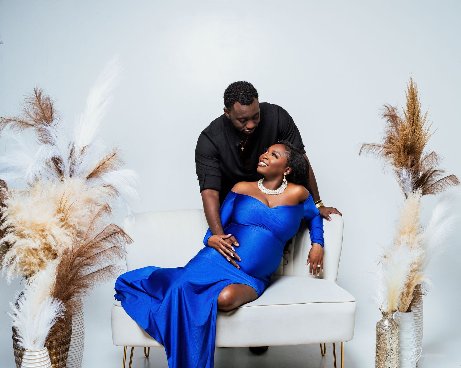 Maternity photoshoot South Florida couple pregnancy session elegant studio setup modern luxury style