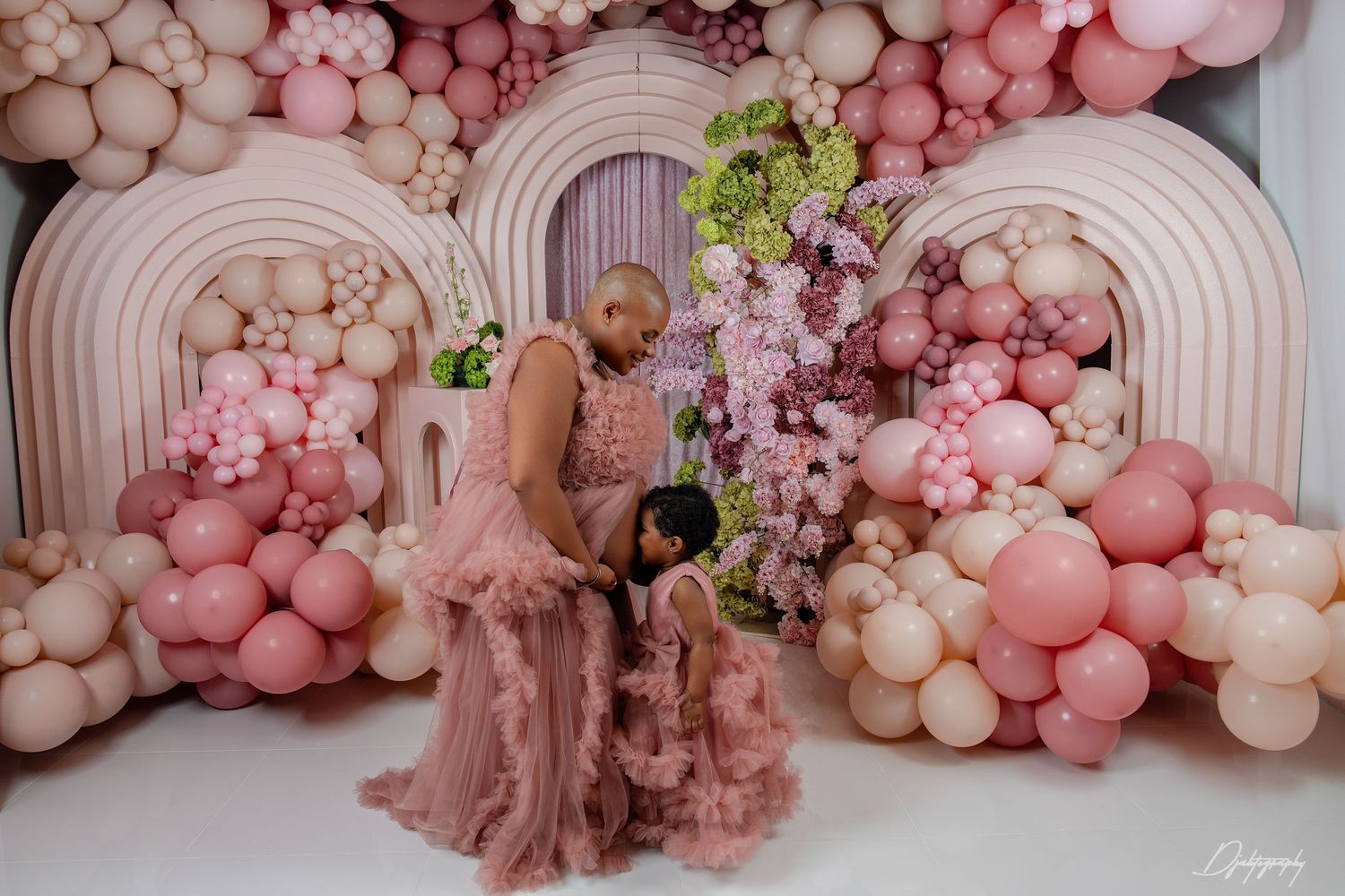 Luxury baby shower photography in South Florida with pink balloon decor and elegant event styling.