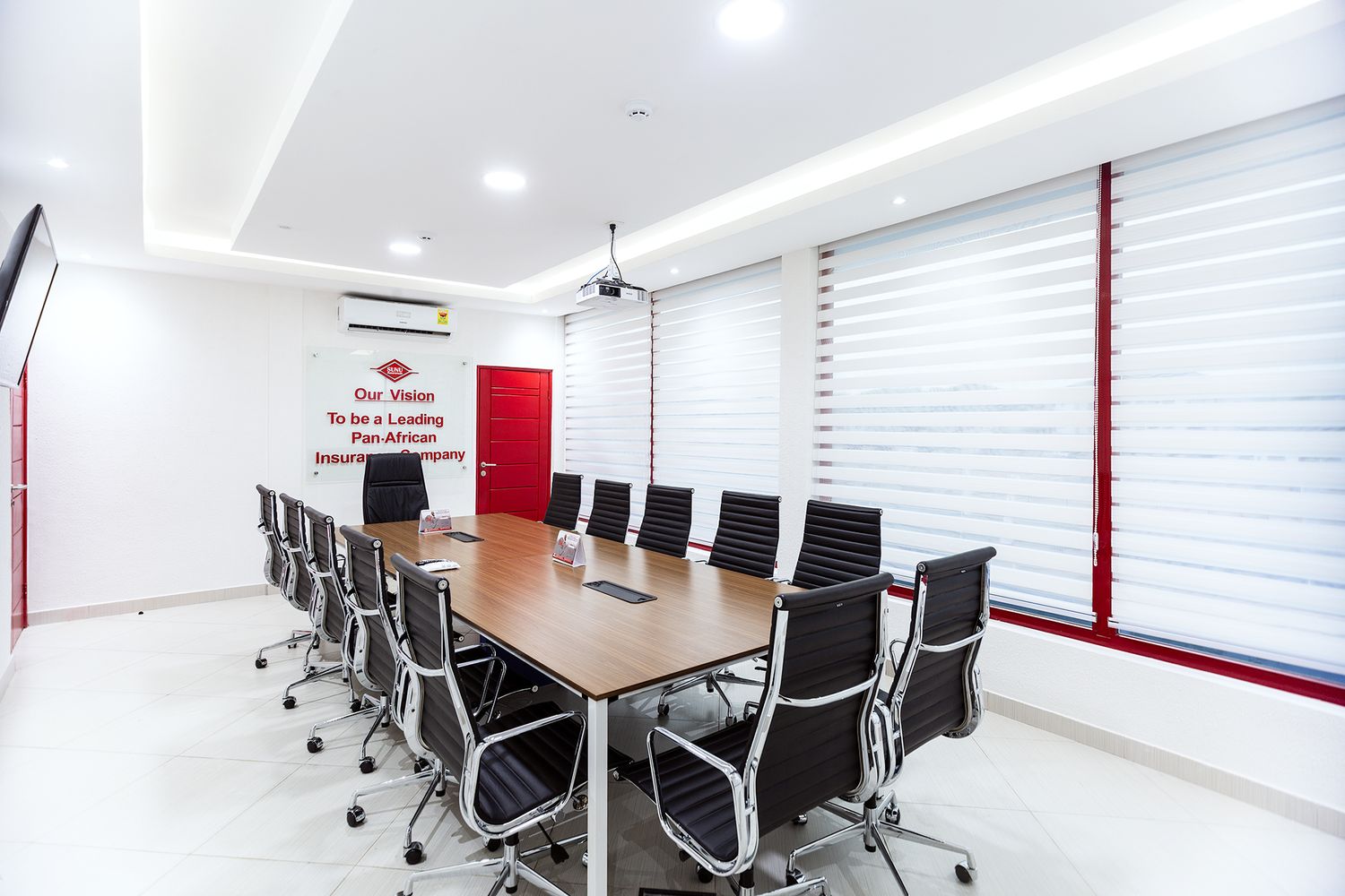 Clean architectural shot of a board meeting interior