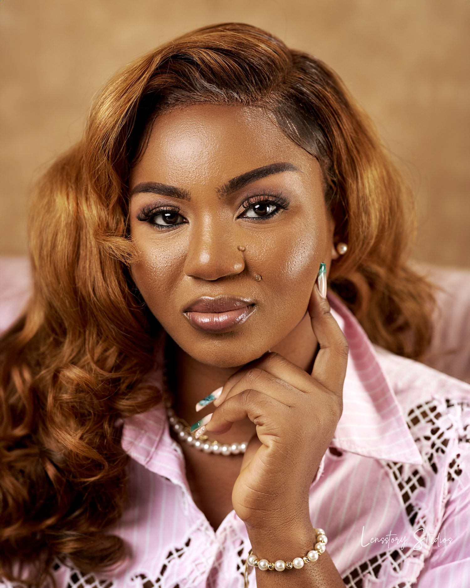 Professional portrait photography in Accra, Ghana by Lensstory Studios, capturing authentic expressions and timeless beauty.