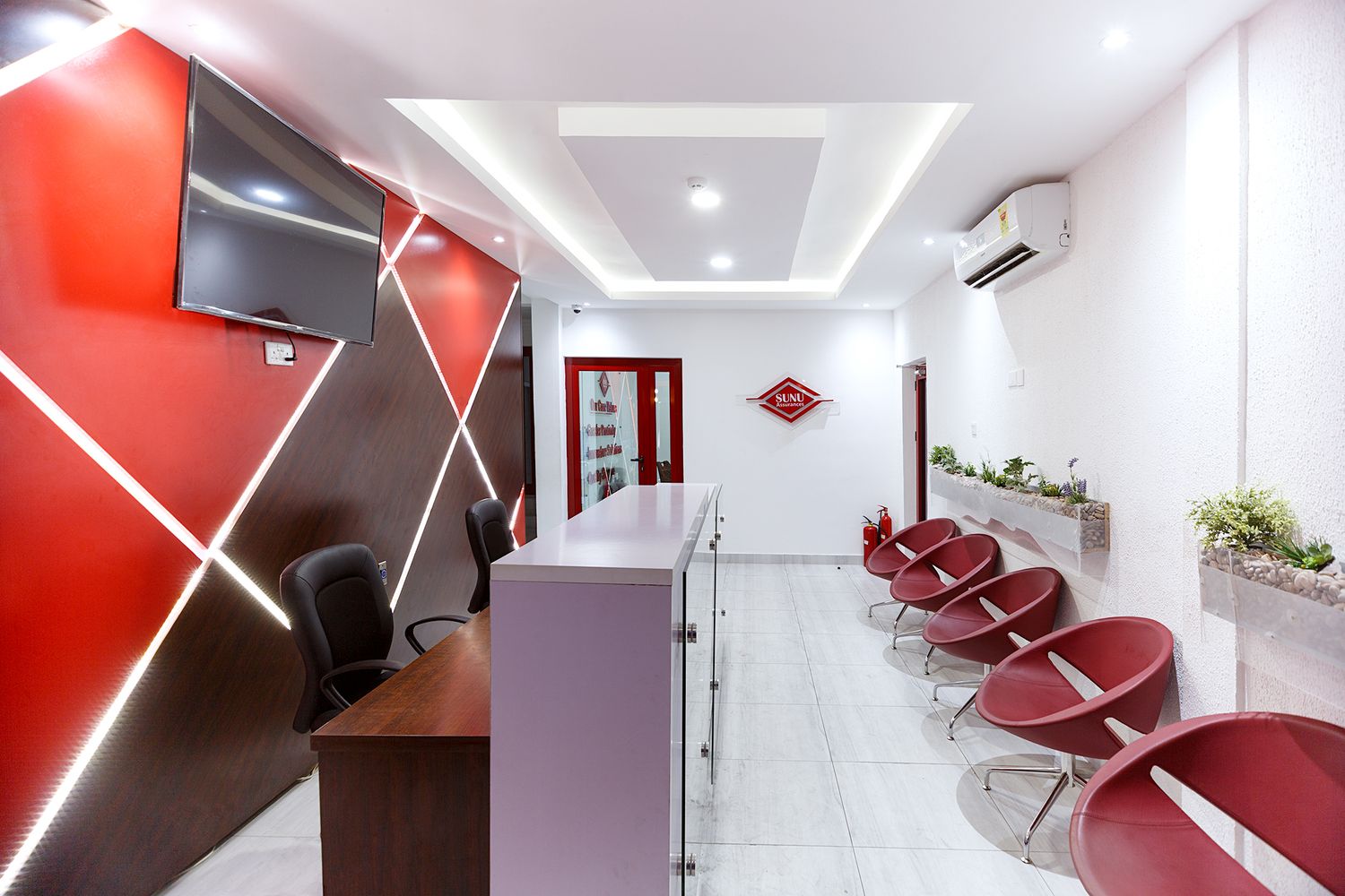 Clean architectural shot of a commercial office reception area