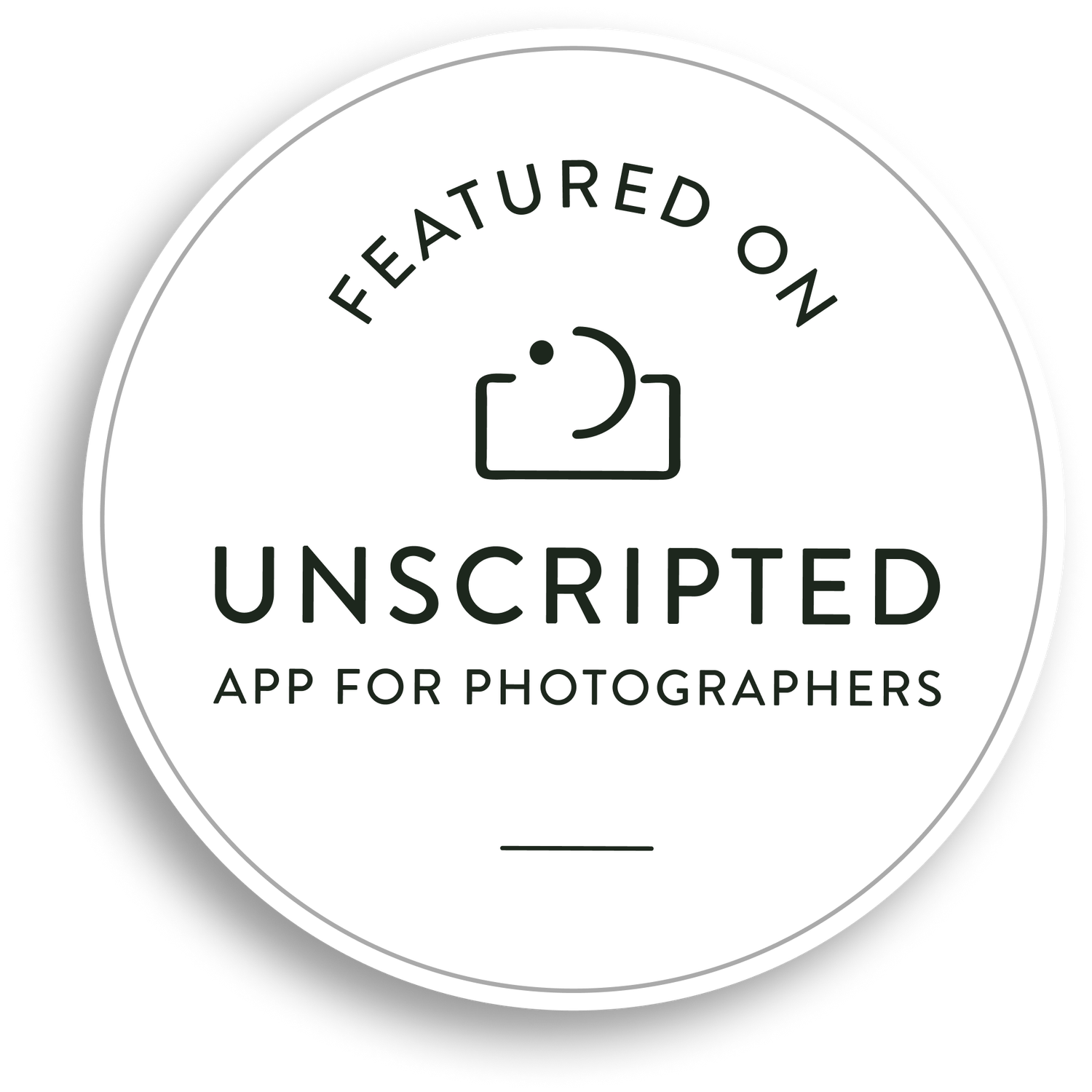 A circular logo for Unscripted photography app featuring a minimalist camera icon and text on white background.