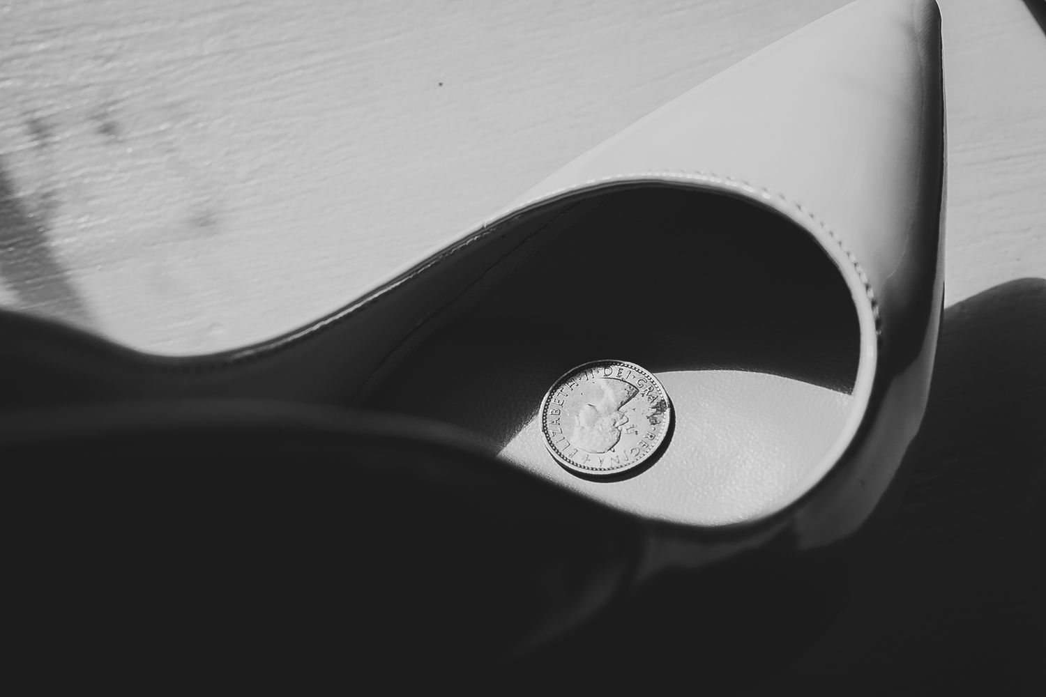 Abstract black and white curved shapes creating artistic composition.