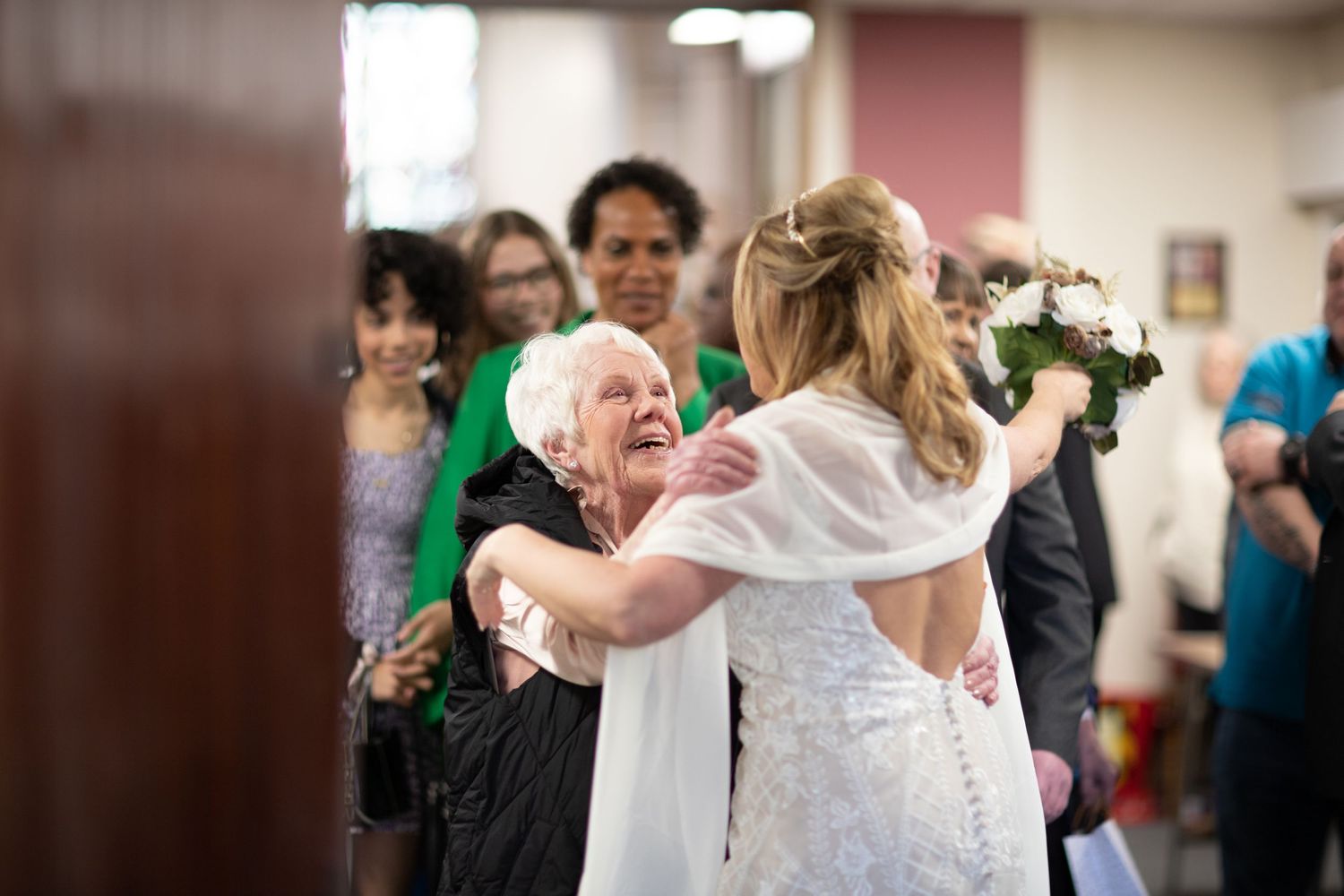 A series of five wedding reception photos showing dancing, embracing, and celebration on the dance floor.