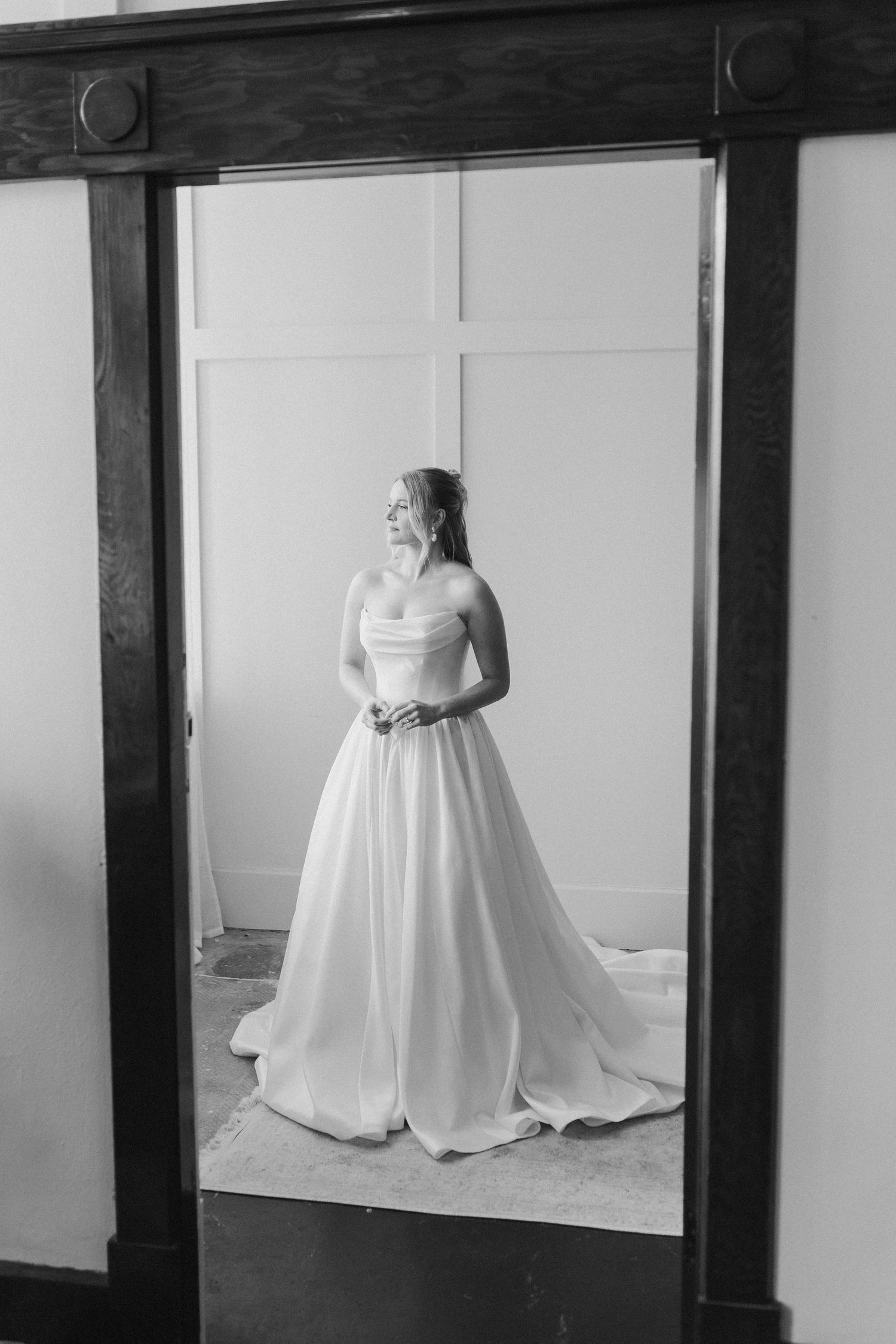 Bride posing for portrait in The Light Loft
