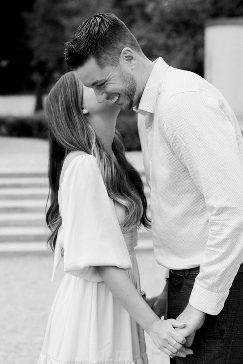 Black and white sequence showing a tender moment between a couple in formal attire.