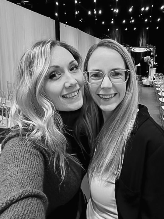 A selfie of Katie and Destiny of Destiny Dawn Photography taken at a wedding venue.