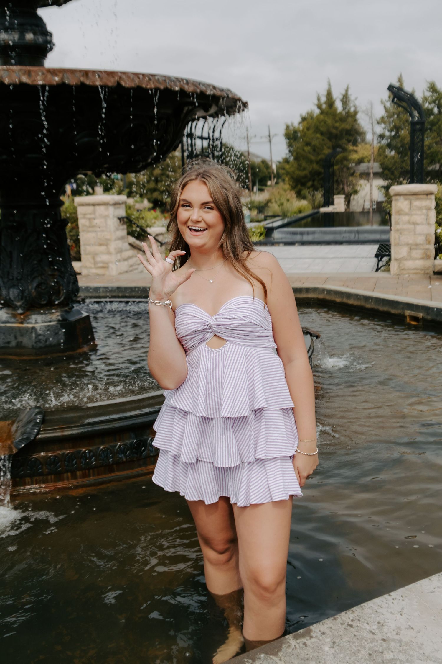 College senior portrait celebrating graduation in Manhattan, Kansas.