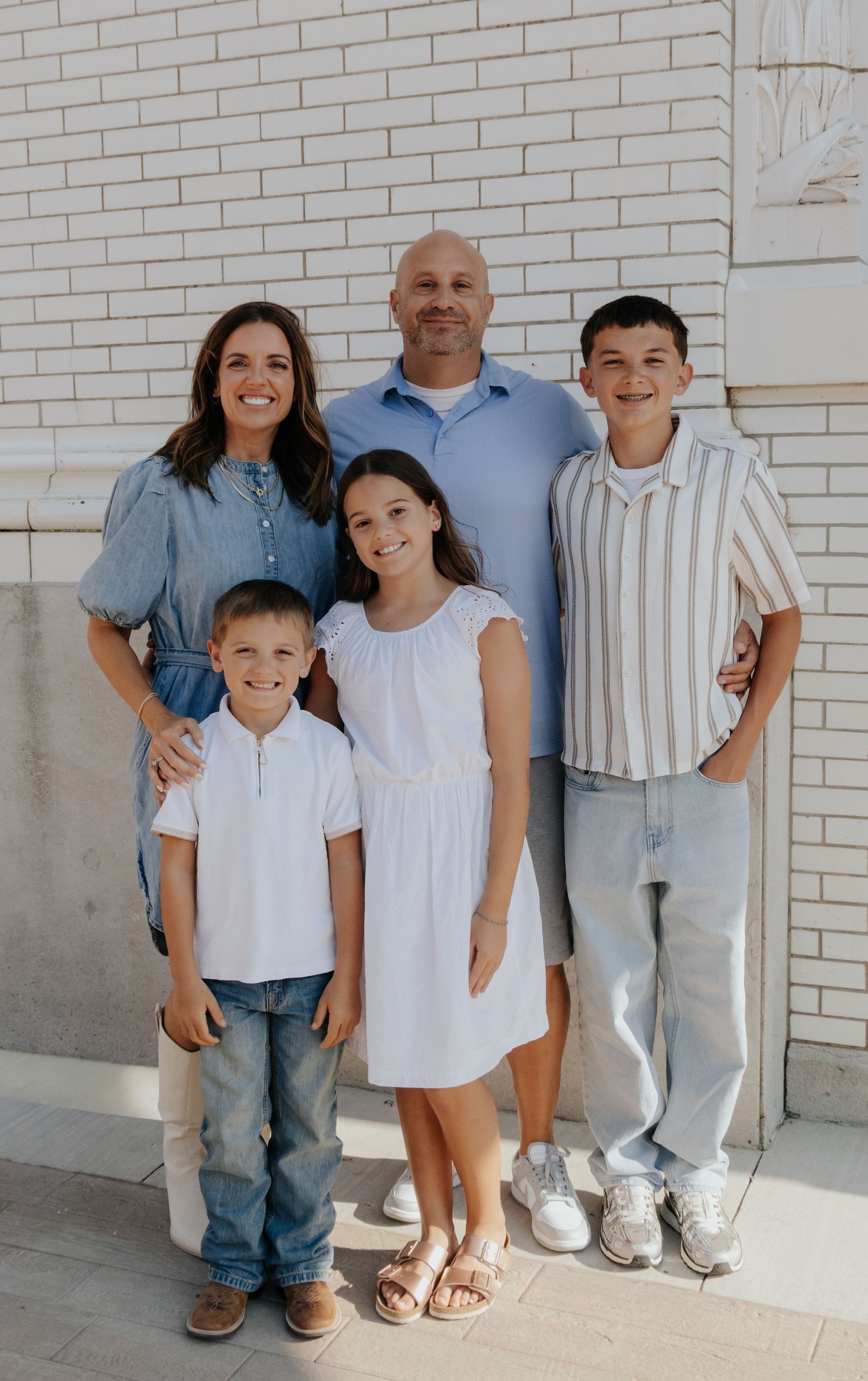 Family posing together during a family portrait session.