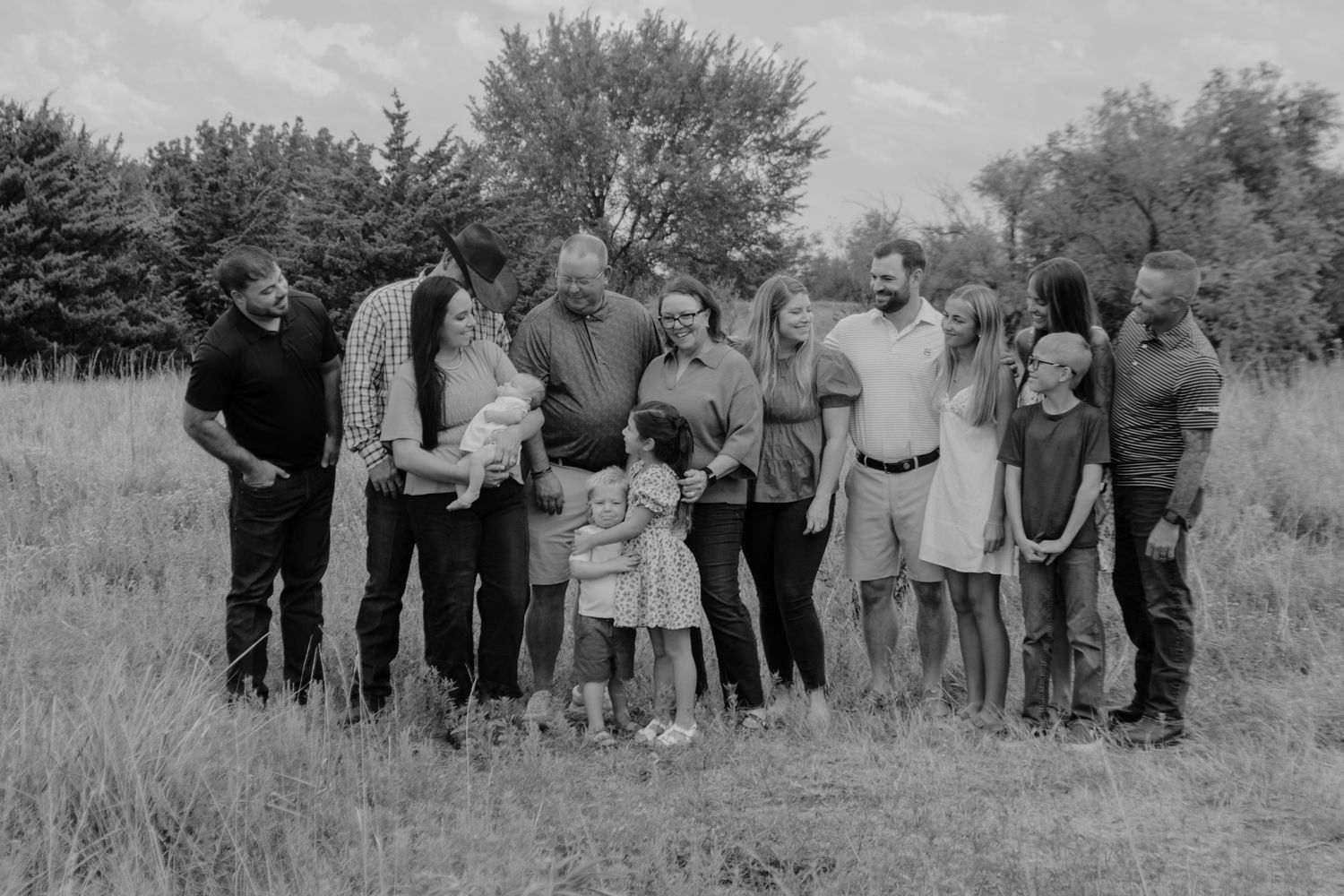 Family posing together during a family portrait session.