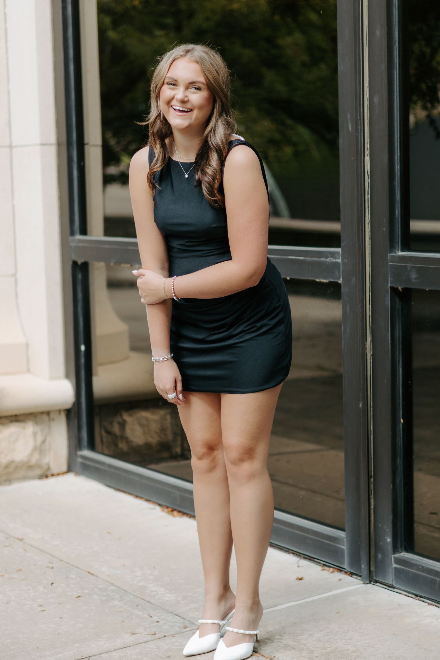 College senior portrait celebrating graduation in Manhattan, Kansas.