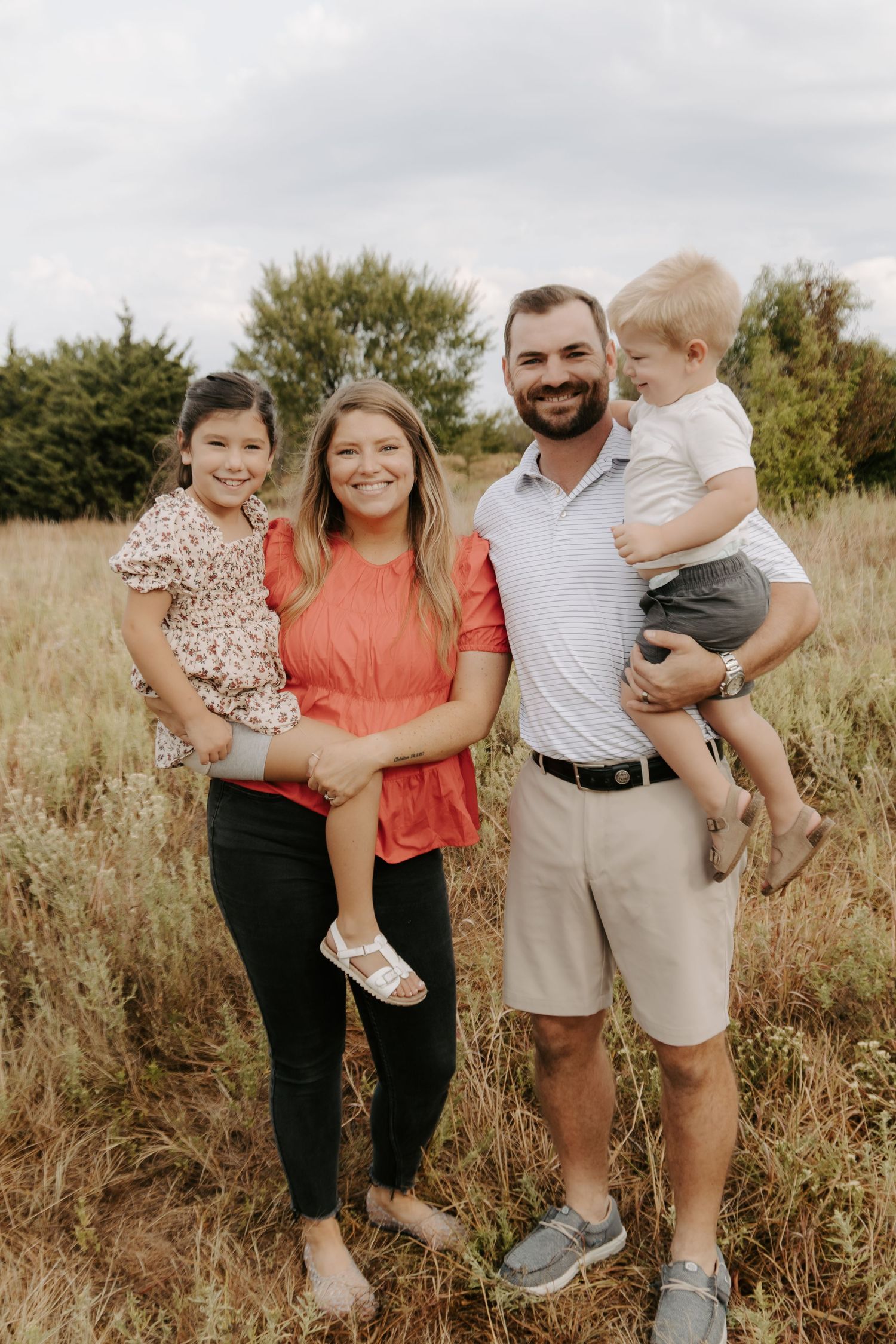 Family posing together during a family portrait session.
