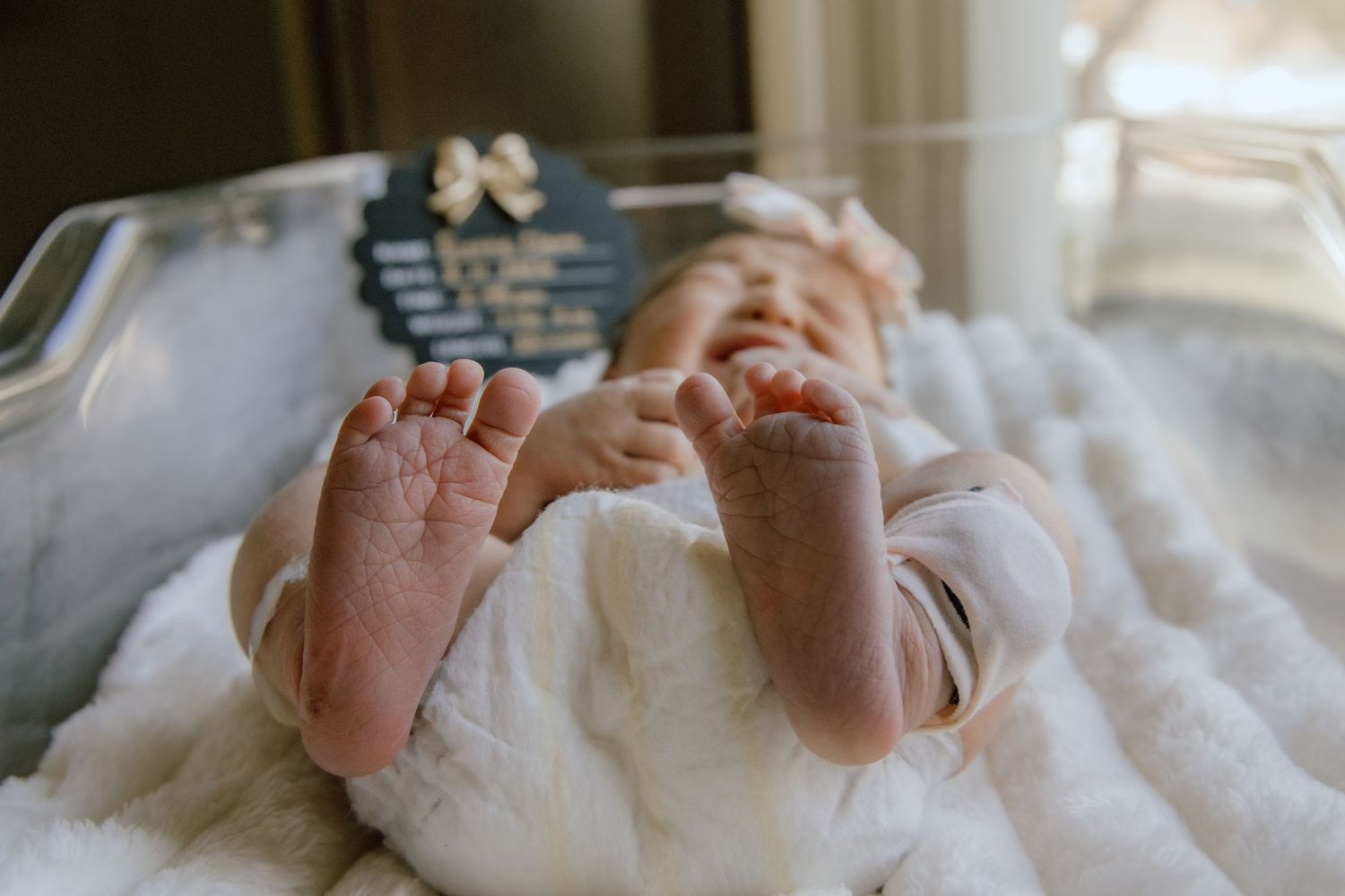 Newborn baby photographed in the hospital during a Fresh 48 session.