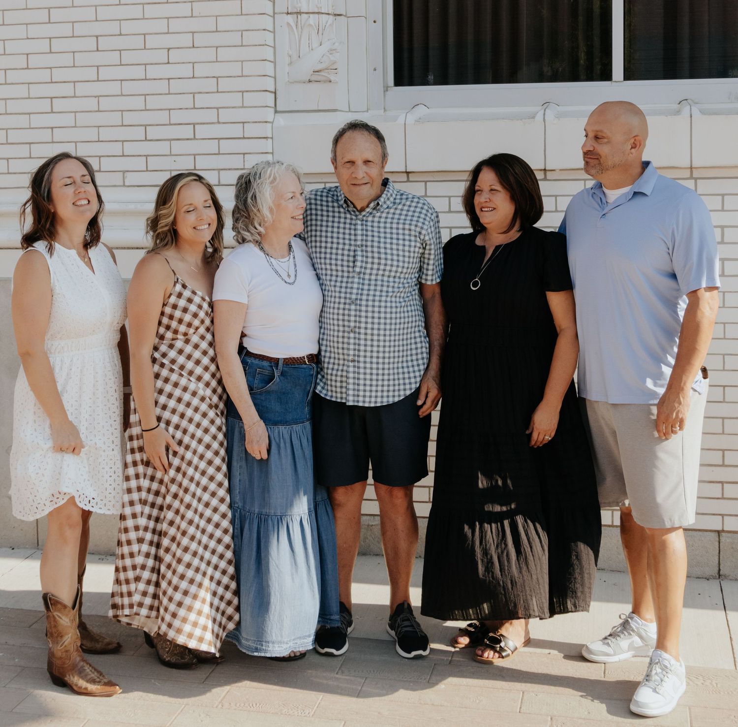 Family posing together during a family portrait session.