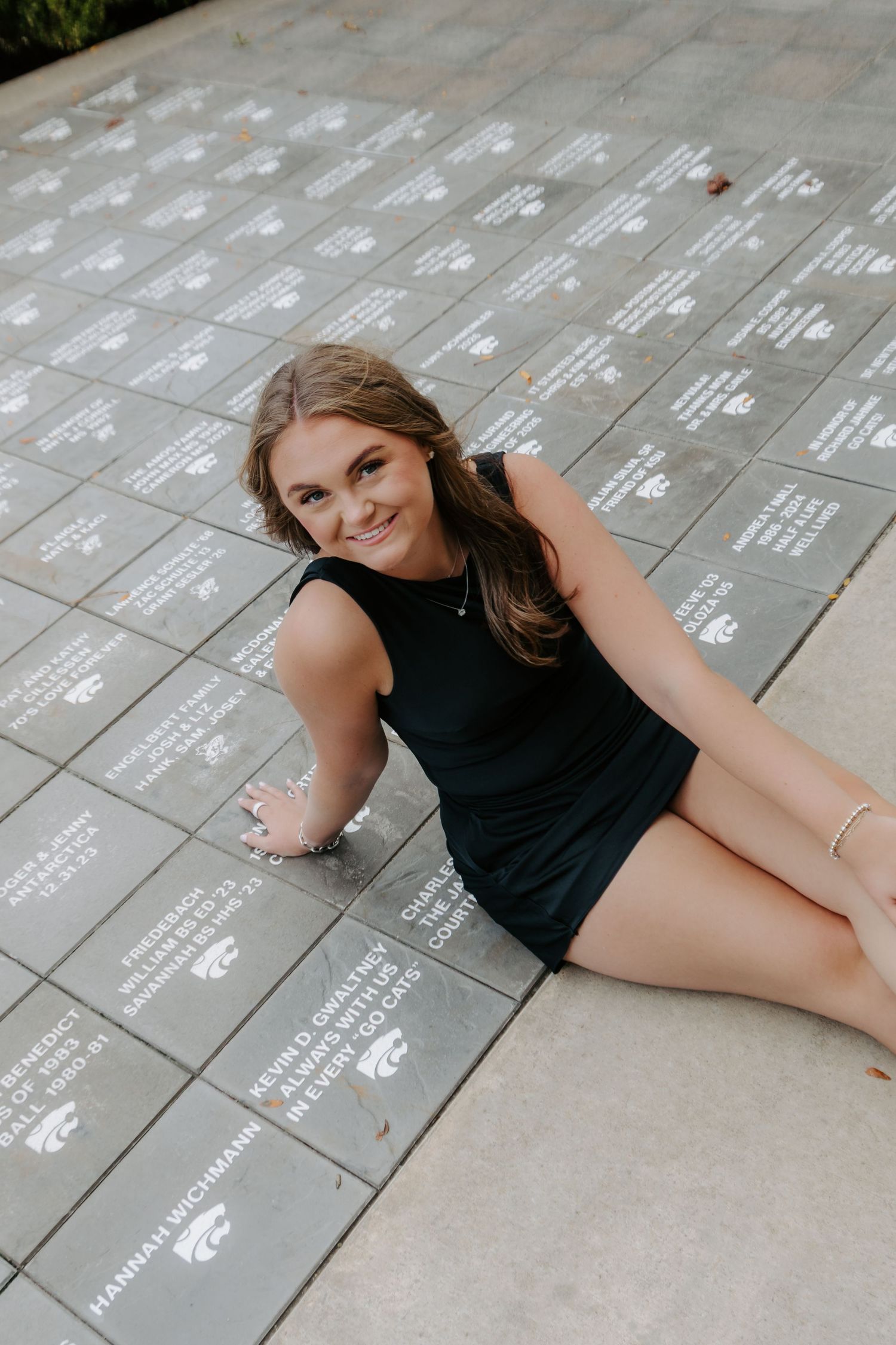 College senior portrait celebrating graduation in Manhattan, Kansas.