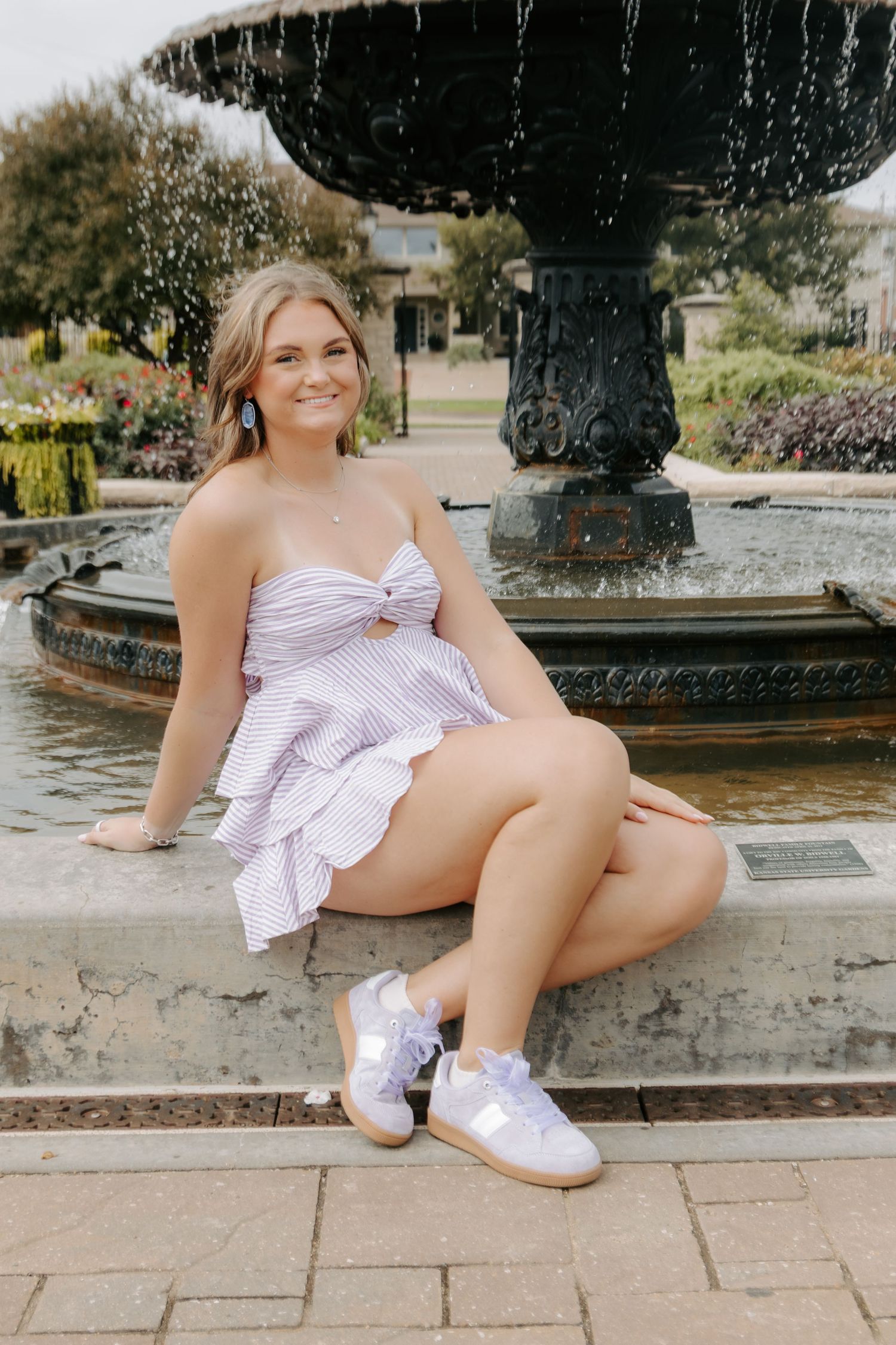 College senior portrait celebrating graduation in Manhattan, Kansas.