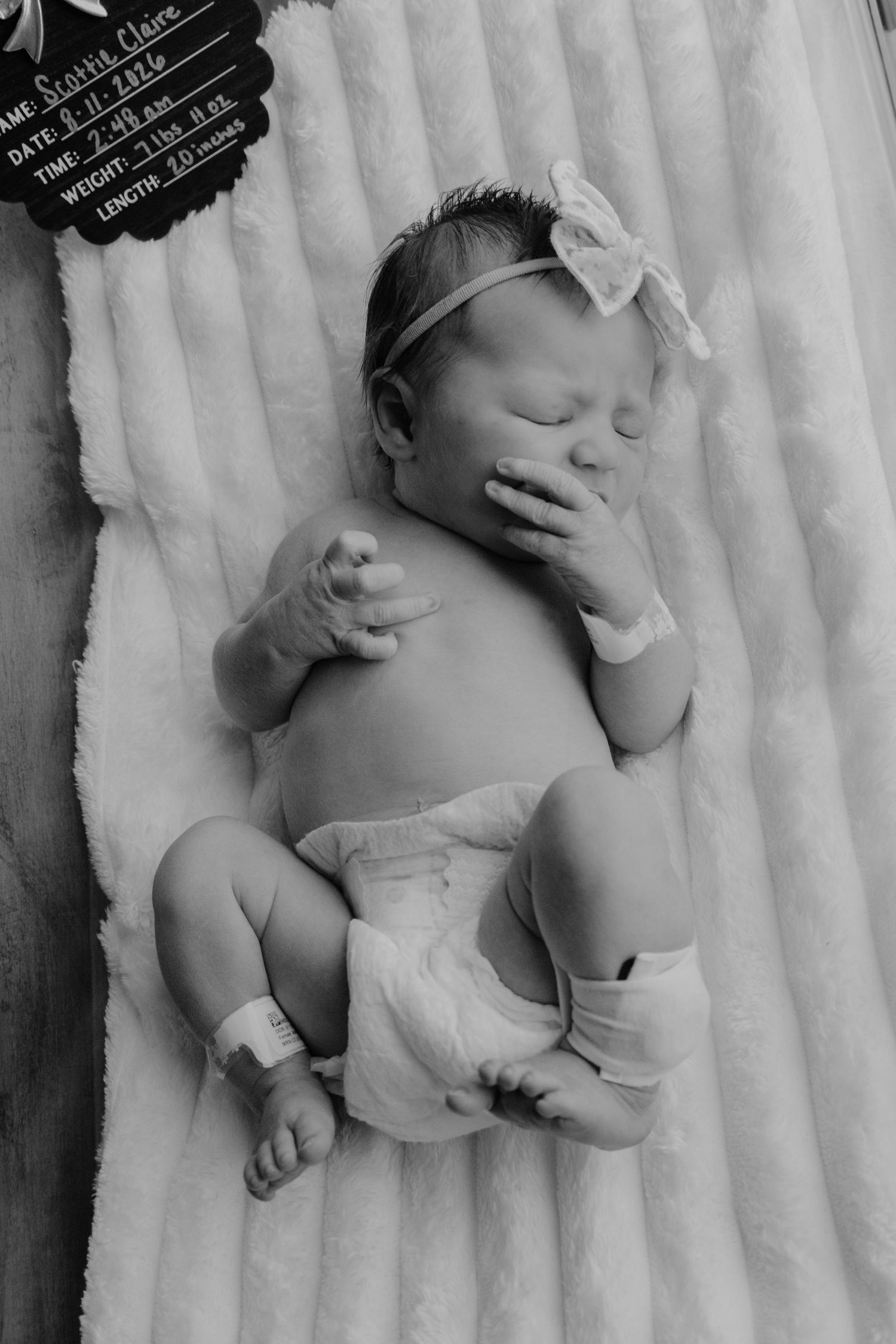 Newborn baby photographed in the hospital during a Fresh 48 session.
