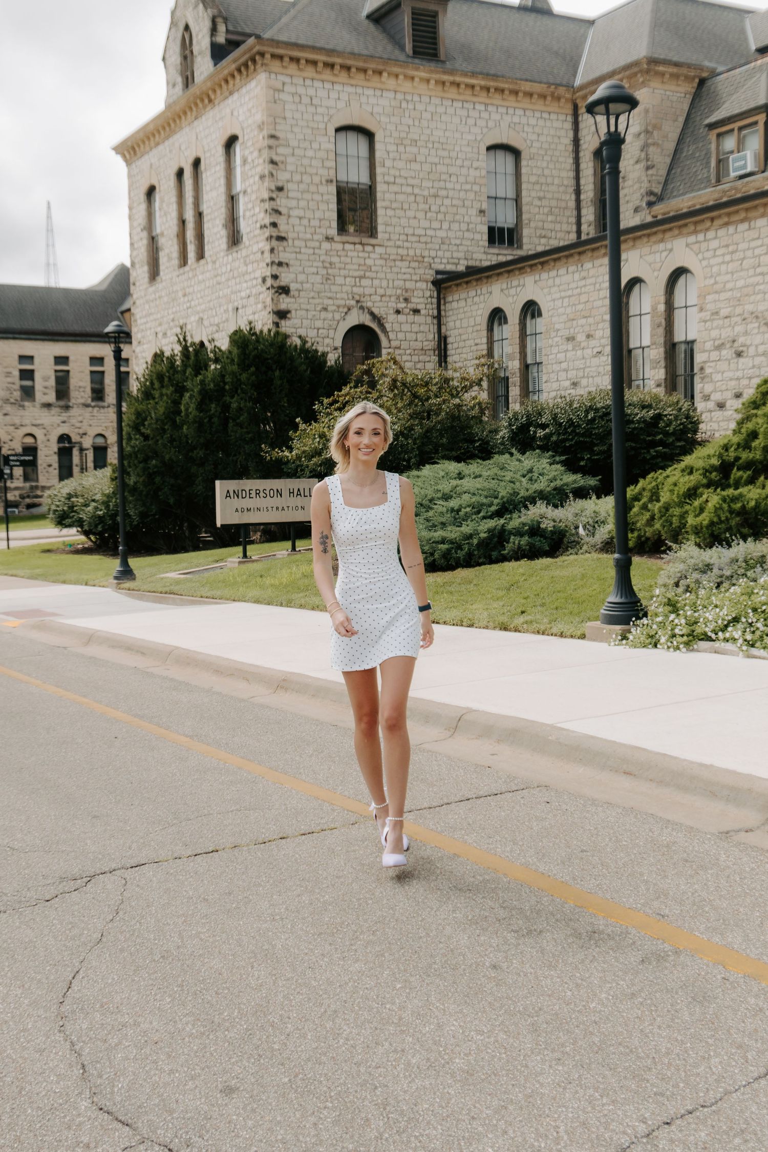 College senior portrait celebrating graduation in Manhattan, Kansas.
