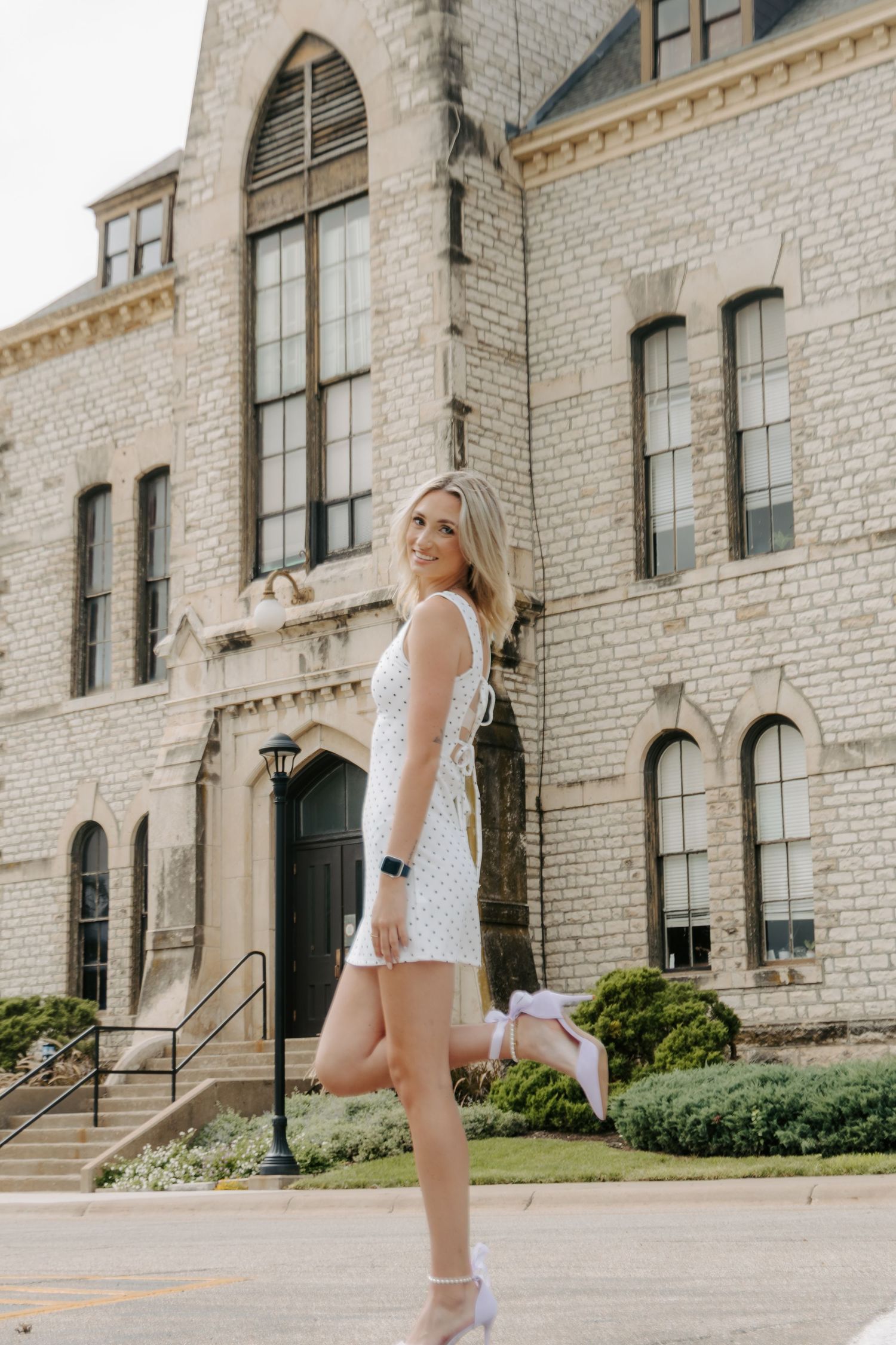 College senior portrait celebrating graduation in Manhattan, Kansas.