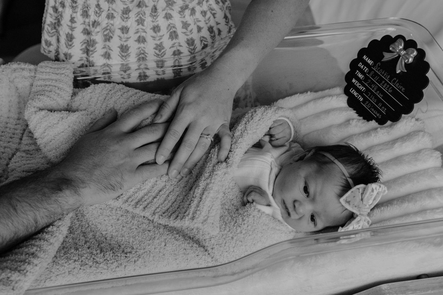 Newborn baby photographed in the hospital during a Fresh 48 session.