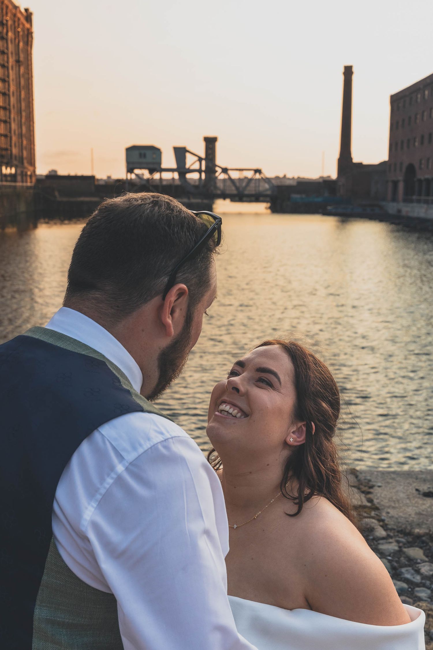 a bride smiling at the titanic hotel in Liverpool