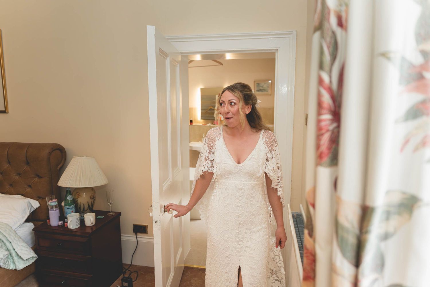 a bride shows off her dress at wedding in county durham