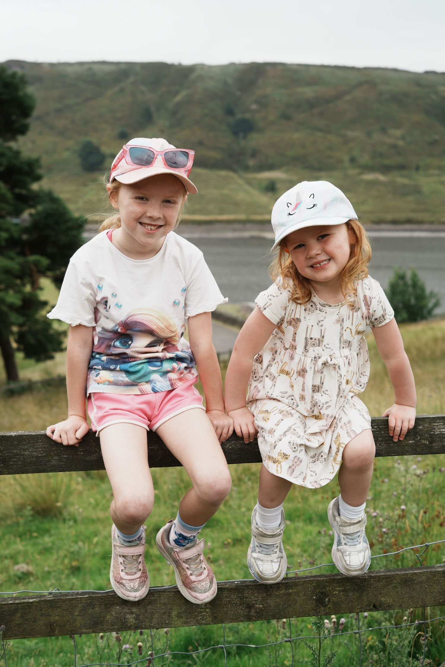 2 children smiling in rawtenstall, Lancashire.