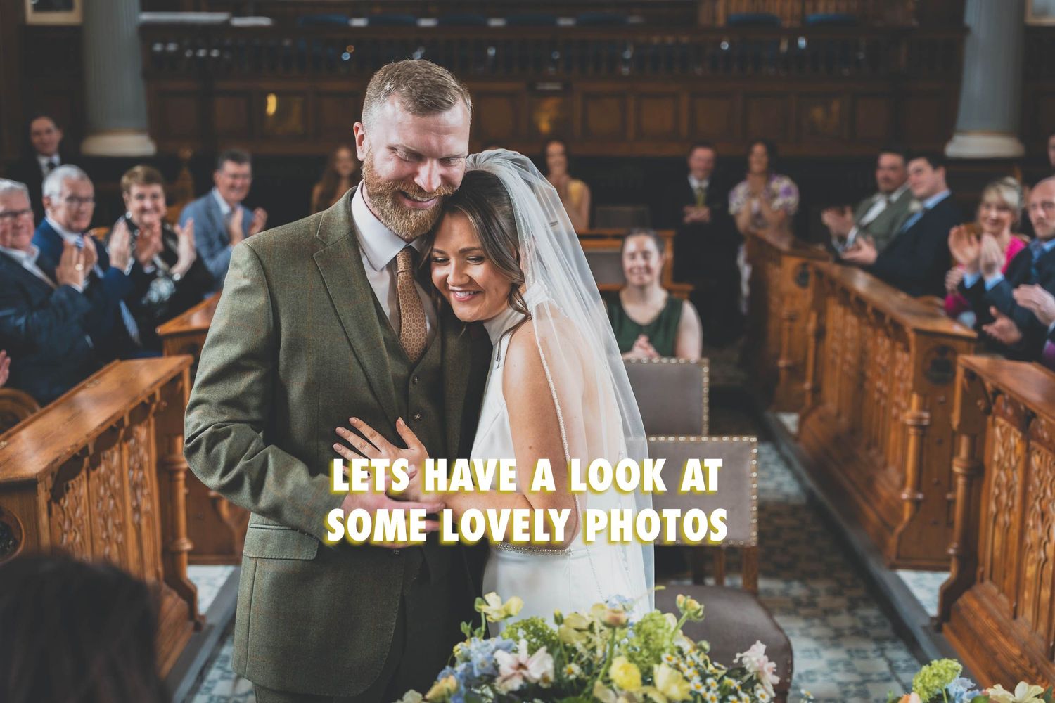 A natural photo of a bride and groom sharing an embrace during their wedding ceremony in Southport