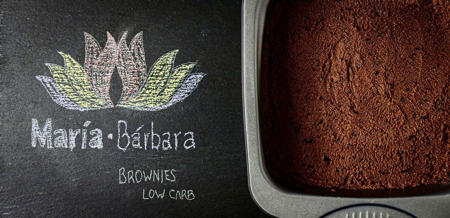 Maria Barbara low carb brownies brand logo on chalkboard with brownie pan.