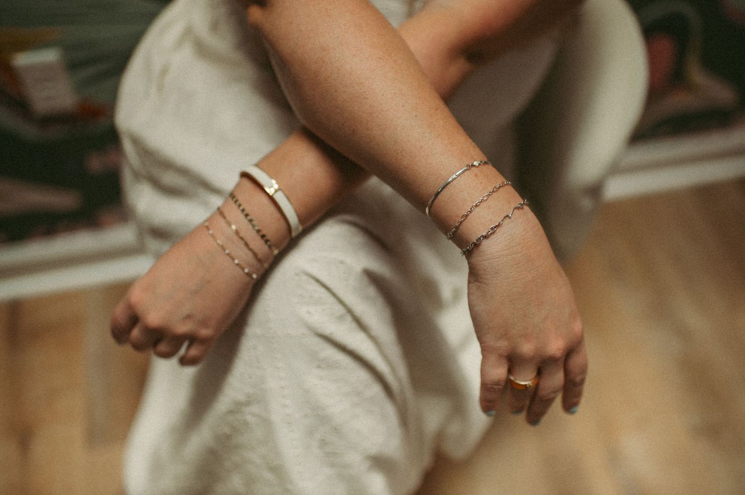 a creative shot of the permanent jewelry on a branding client in Virginia Beach.