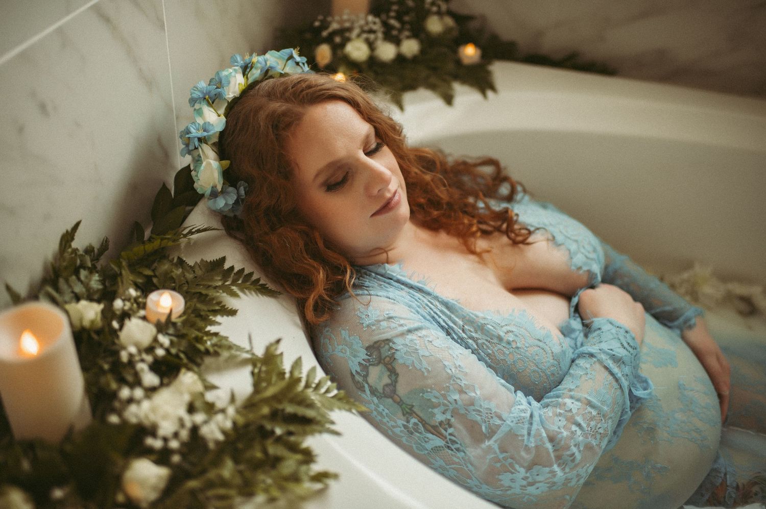 Expecting mom posing for her milk bath maternity session in Suffolk, Virginia.