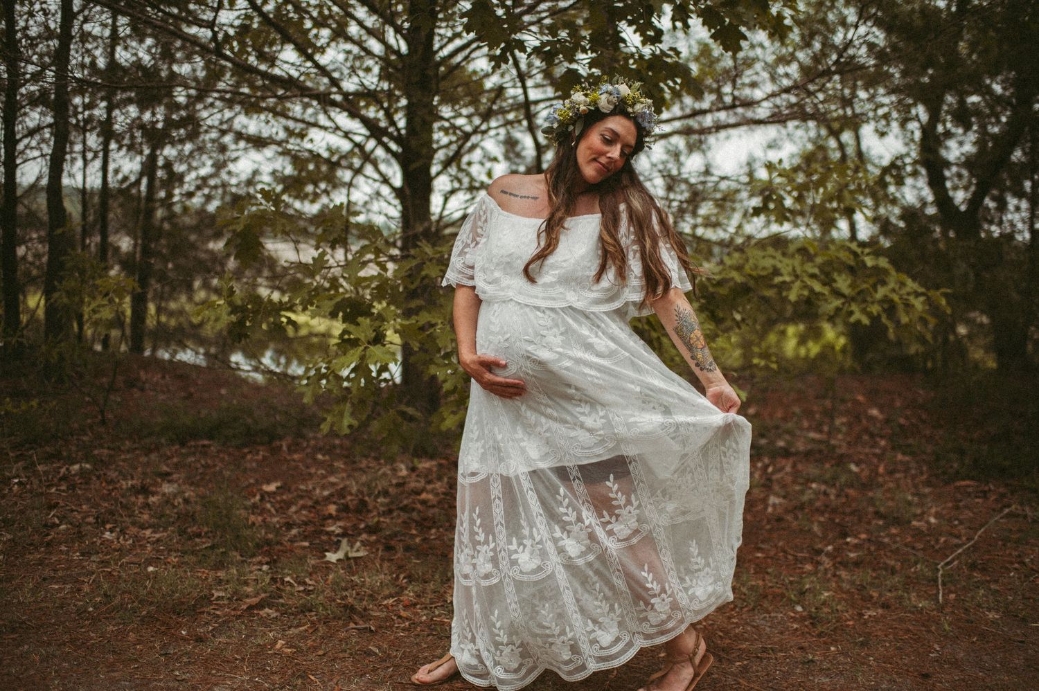 Expecting mother frolicking in a local Chesapeake, Virginia in a local park for a maternity session.