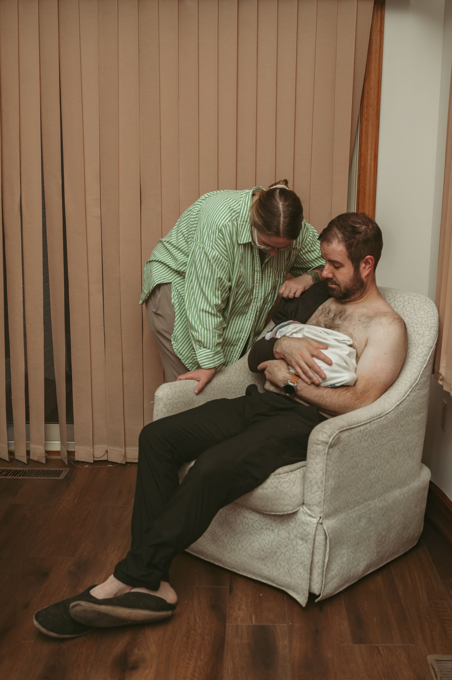 Brand new parents basking in the newborn glow at their sister/sister-in-law's home after she gave birth to their baby boy in Newport News