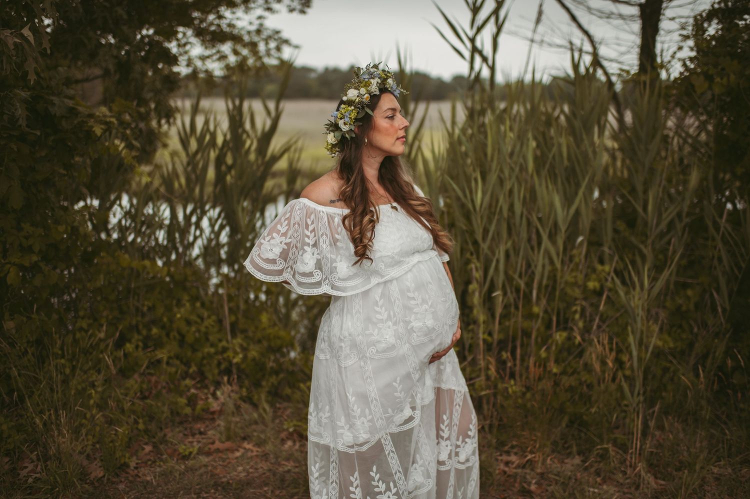 Expecting Hampton, Virginia resident posing for her maternity session at a local city park.