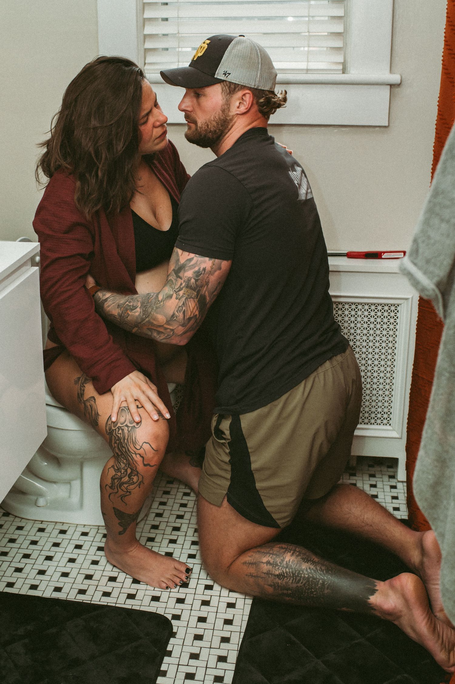 Norfolk residents support each other through intense birth contractions while sitting on their toilet at home.