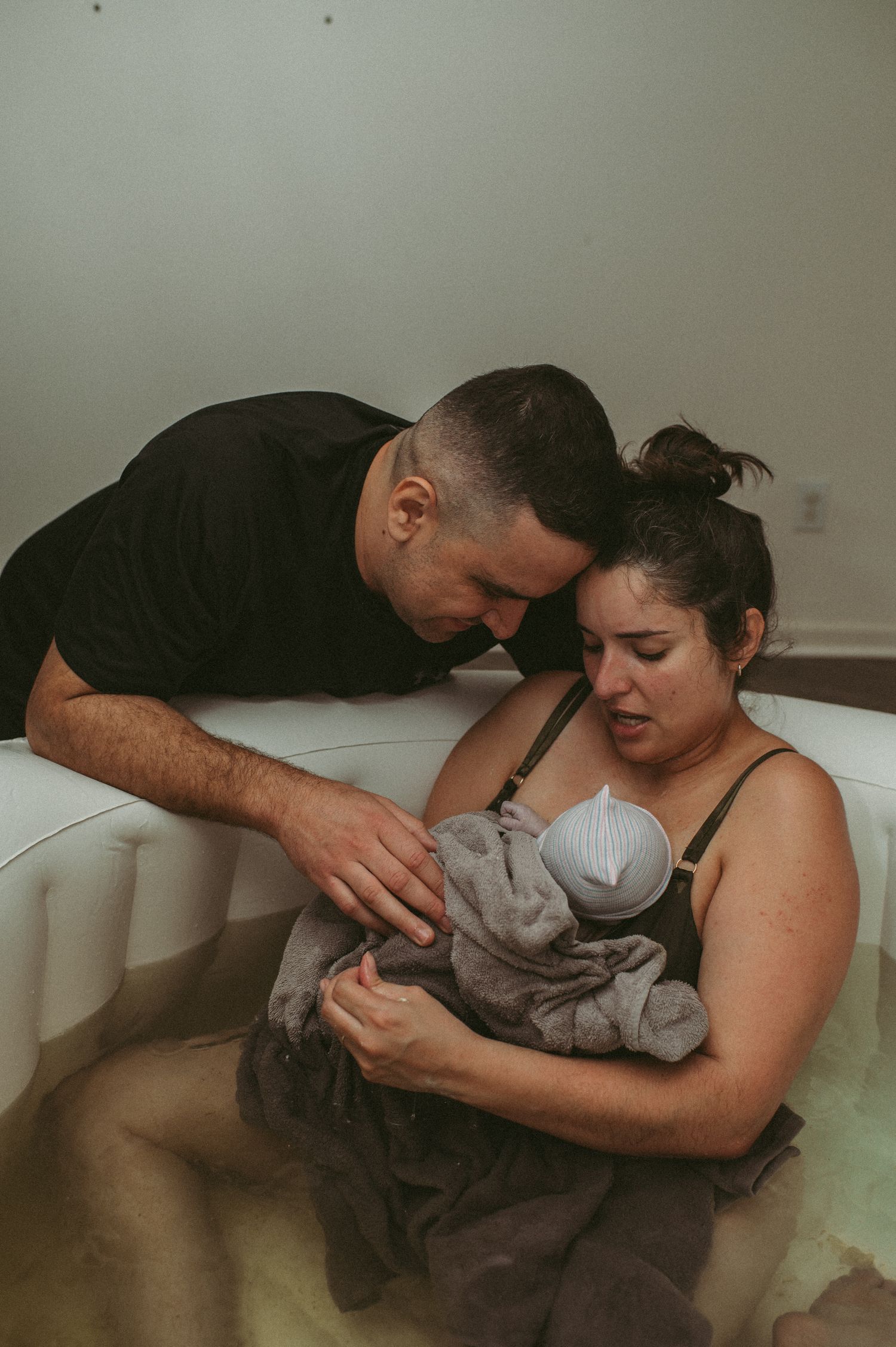 Hampton, Virginia couple welcome baby boy at home in a birth pool in the wee morning hours.