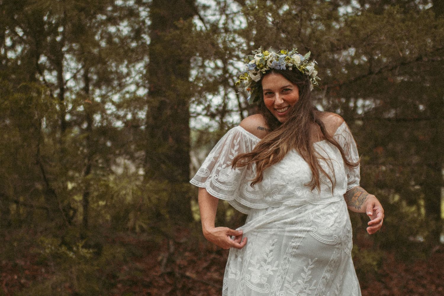 Expecting Chesapeake mother frolicking in the woods while her photographer snaps pictures.