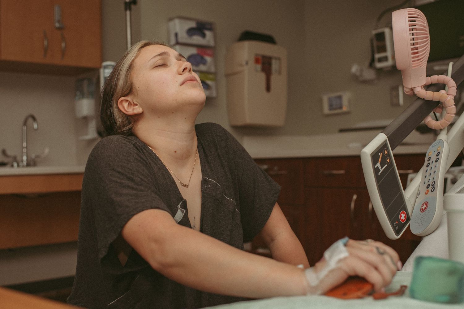 First time mom trying to breathe through an intense contraction at a local hospital in VA.