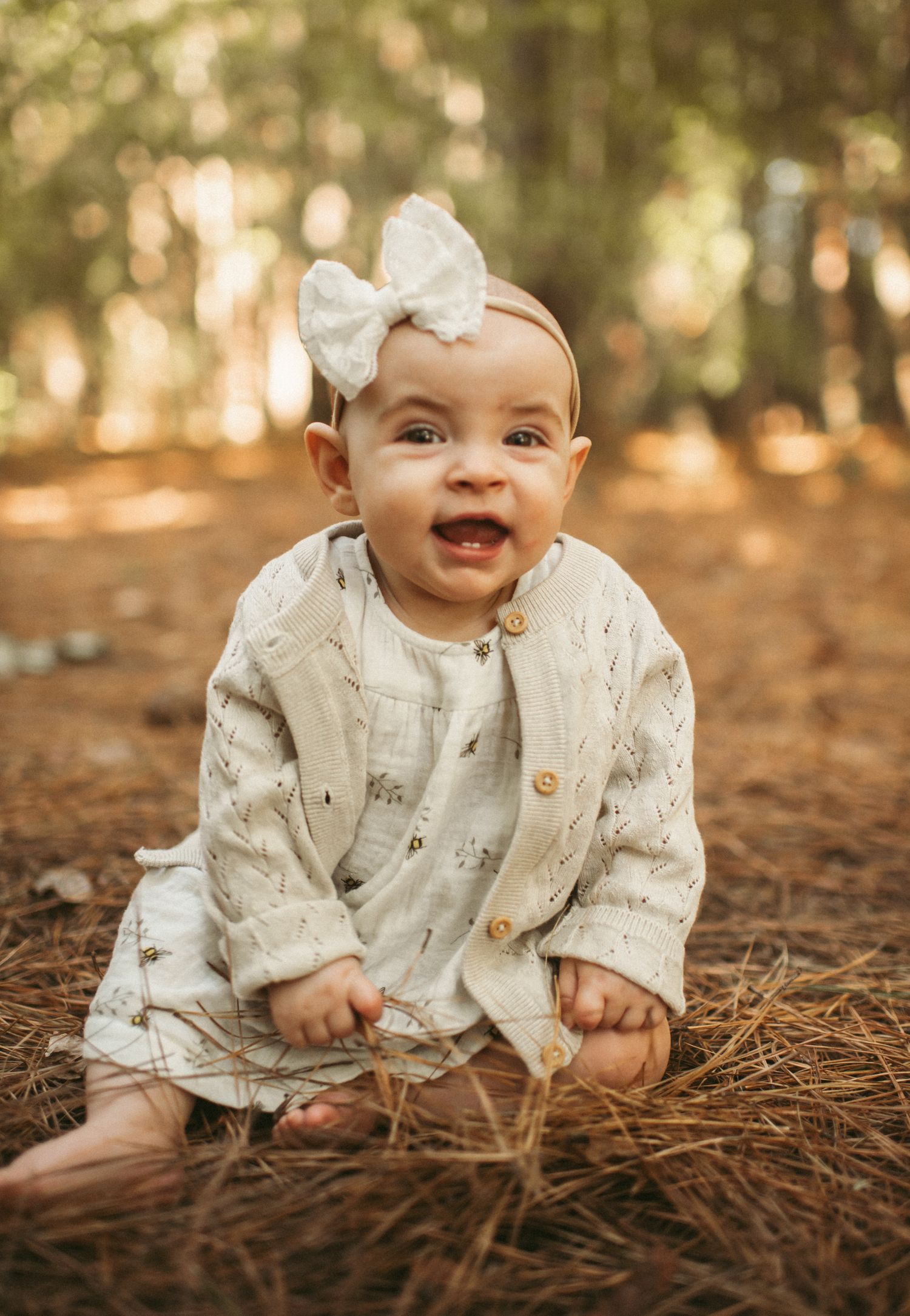 7 month old baby girl posing for a milestone photoshoot in Chesapeake, VA.