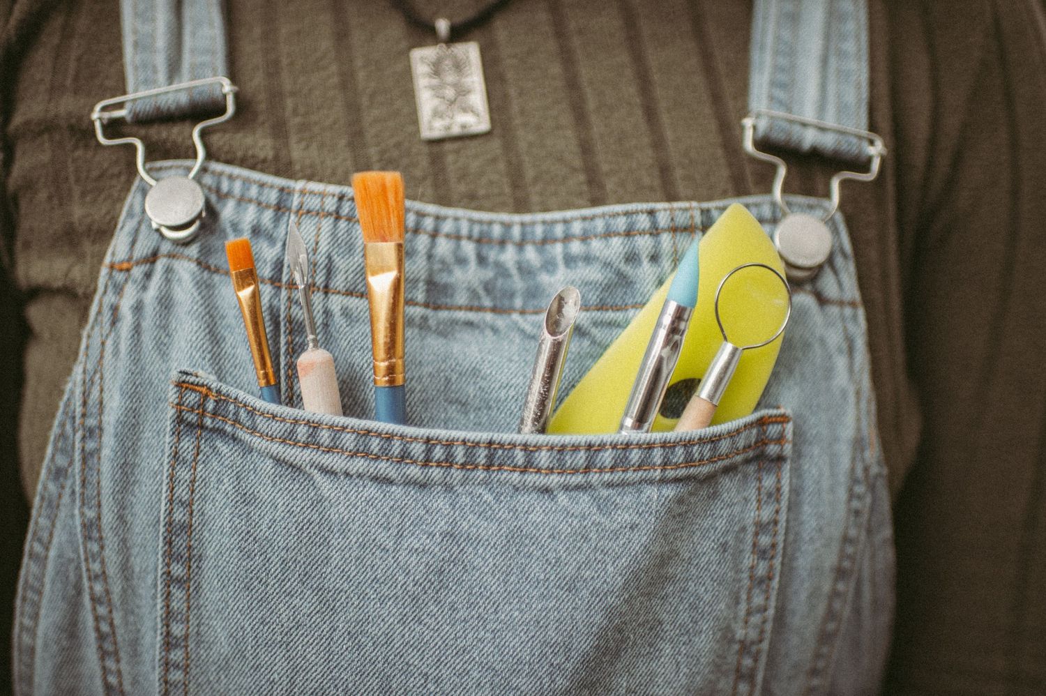 A creative branding shot of tools used for pottery clay in Virginia Beach, Virginia