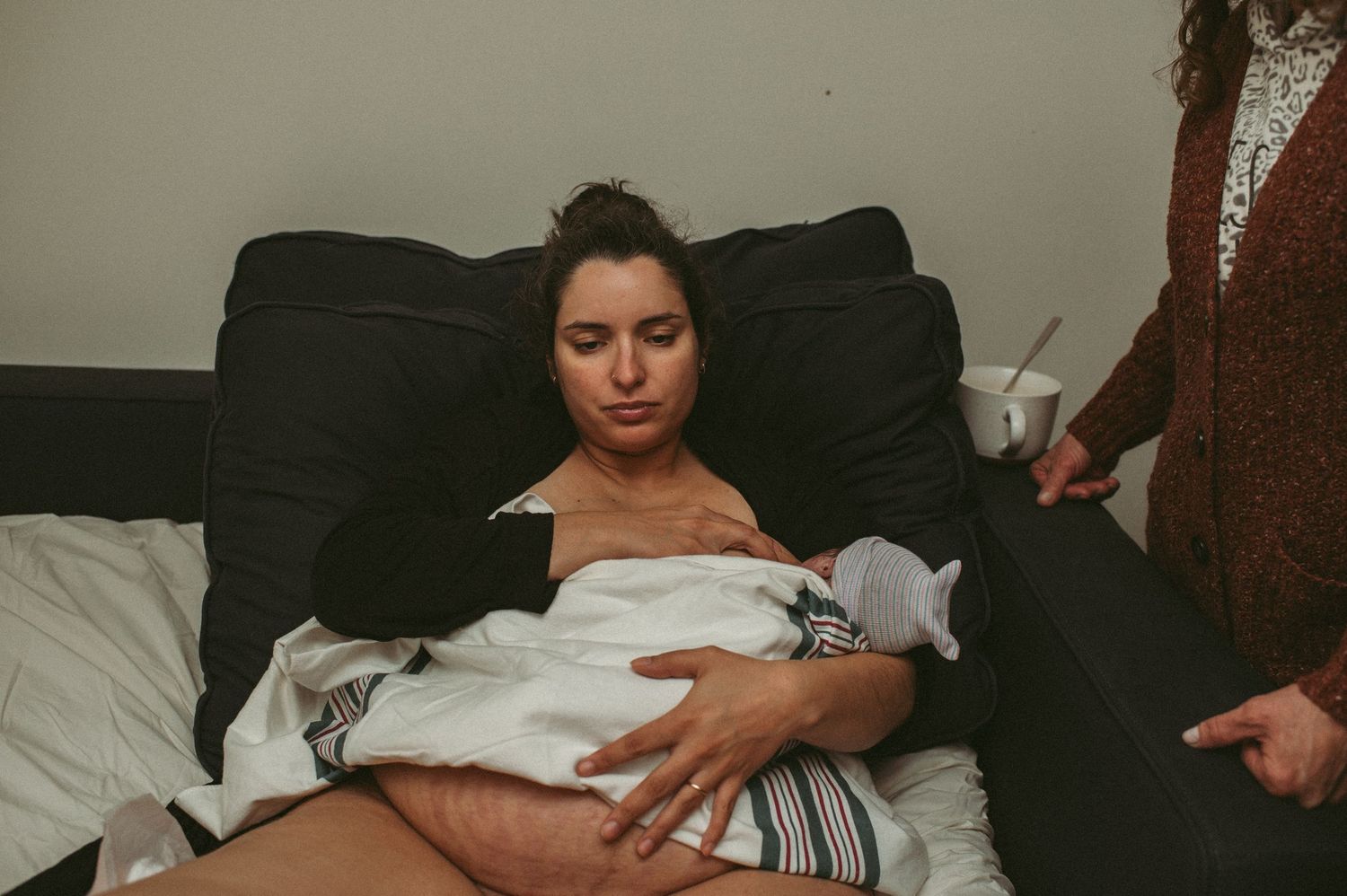Hampton, Virginia mom nurses brand new baby boy moments after giving birth in her home.