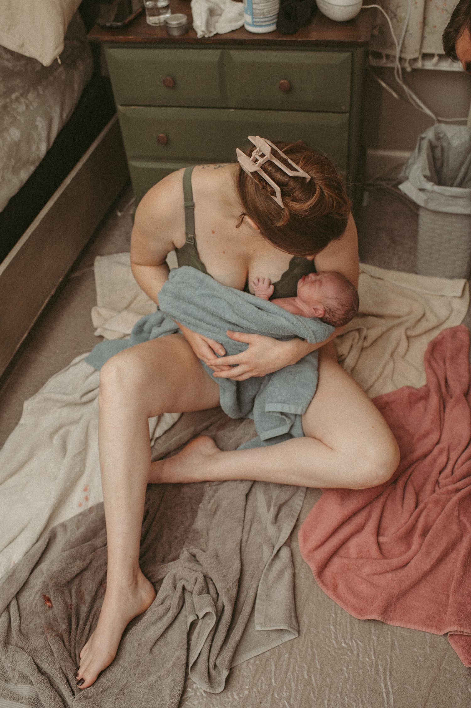 Elizabeth City mom soaking up the moment meeting her brand new baby girl in her home.