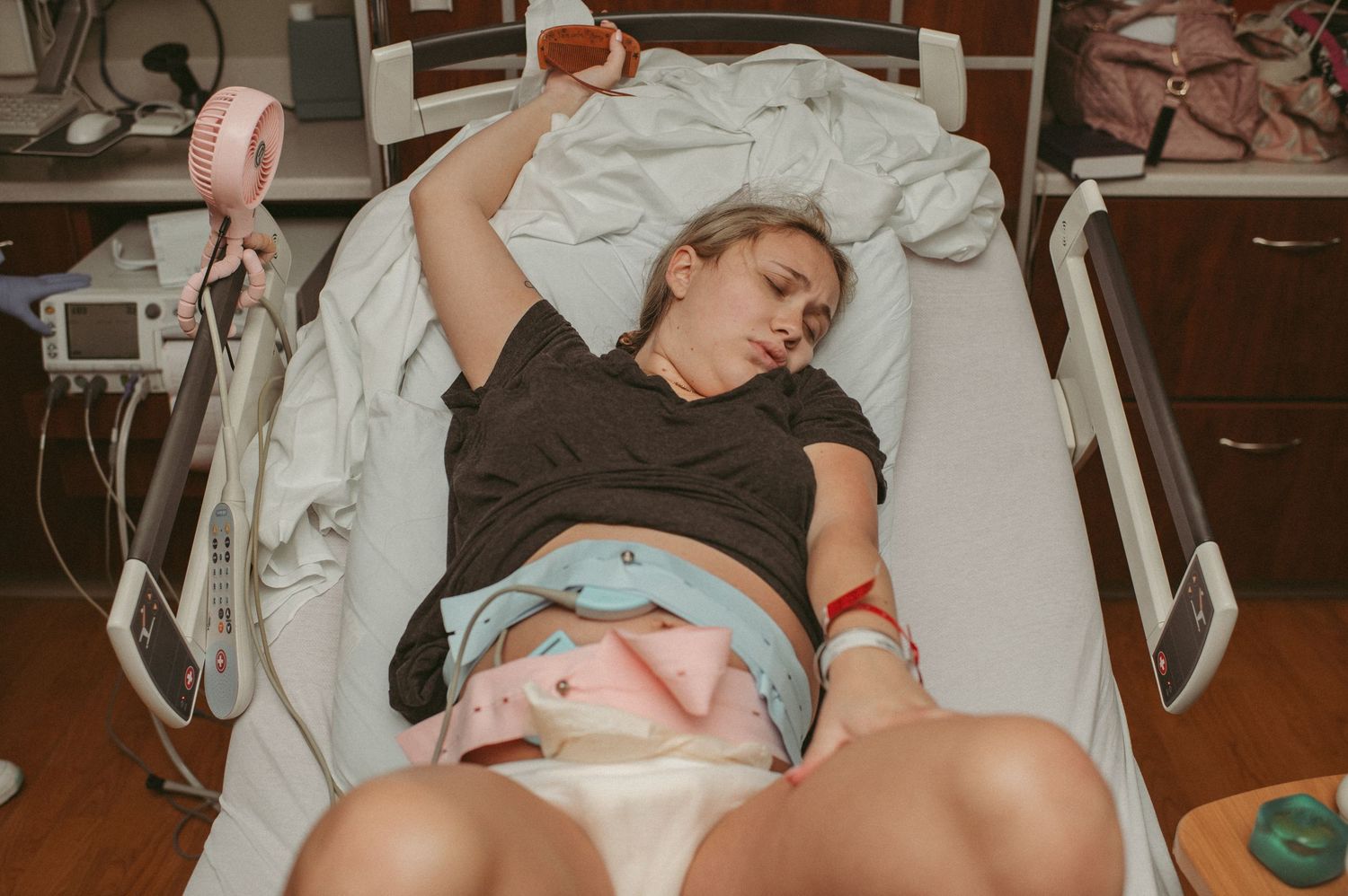 Laboring mom at Riverside Medical Hospital captured by her Virginia Birth Photographer.