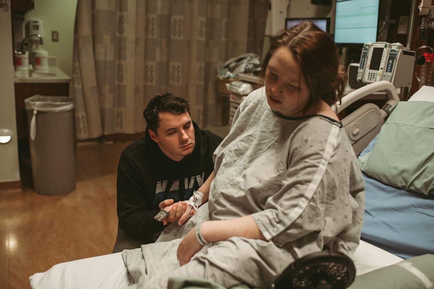 Laboring mom taking a breather during contractions at the Portsmouth Naval Hospital.