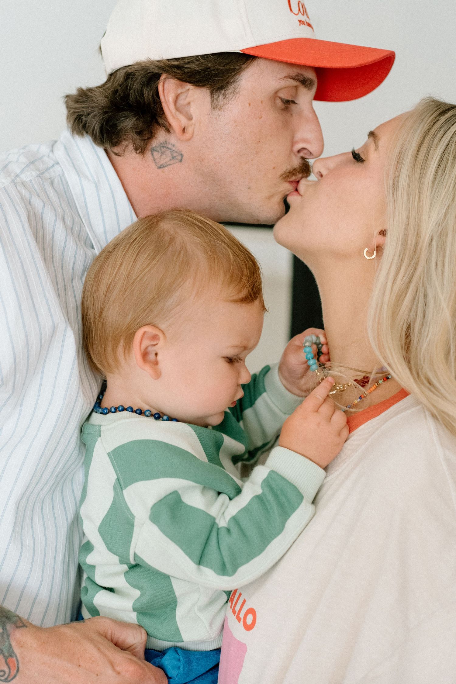 Intimate candid moments captured between a couple sharing affectionate kisses in a photo collage sequence.