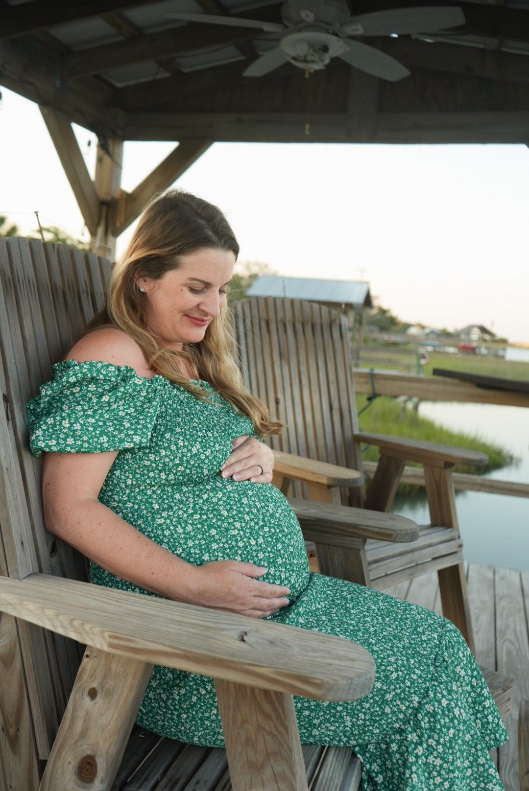 Maternity photoshoot on a dock near Myrtle Beach, South Carolina.