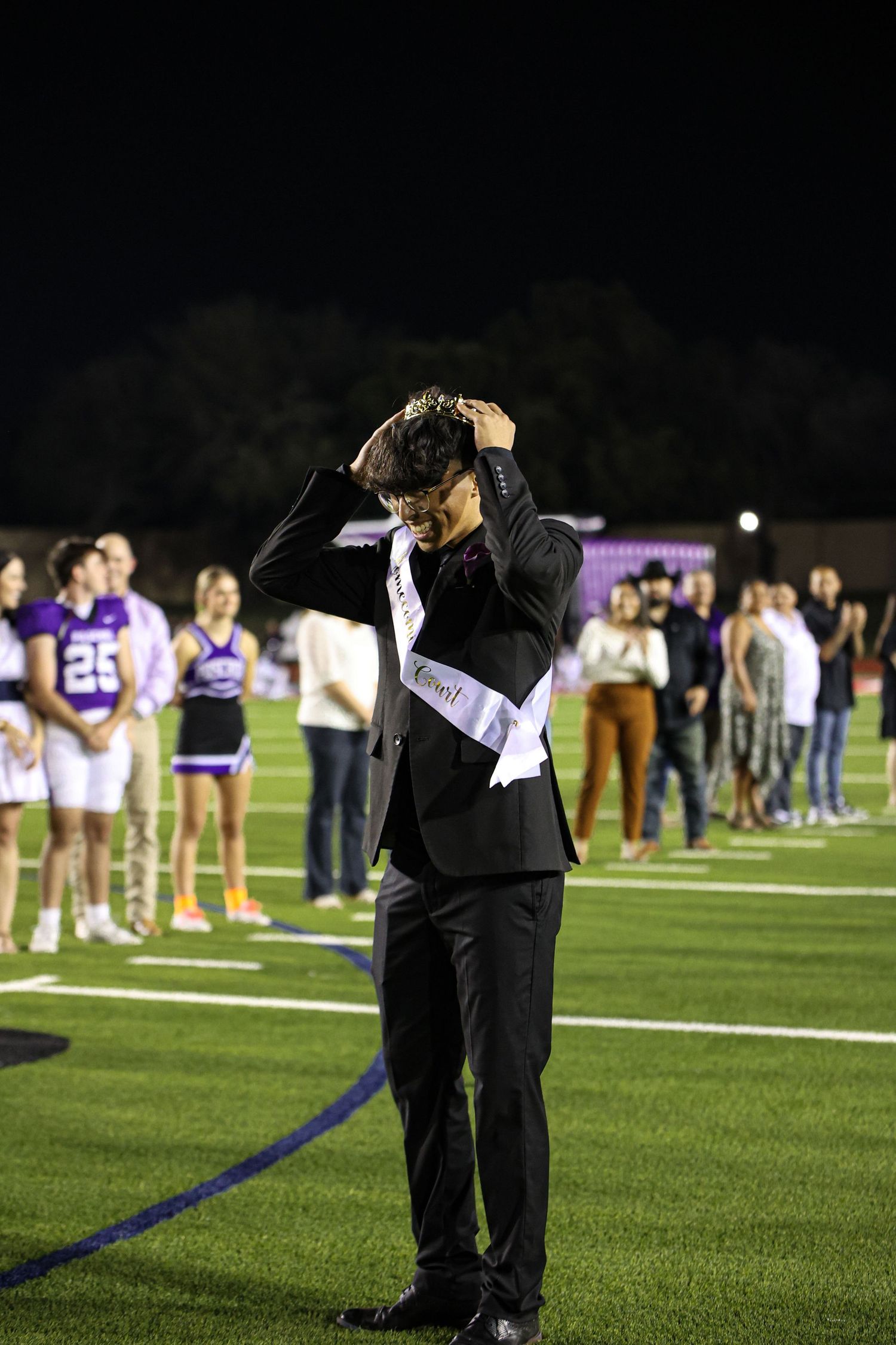 R.L. Paschal High School announces the homecoming king who is happy to accept the honor.