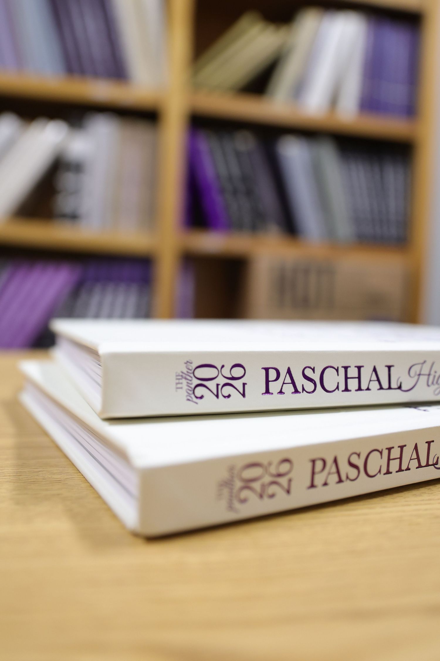 R.L. Paschal High School's award-winning Panther Yearbook is displayed in front of its previous volumes.